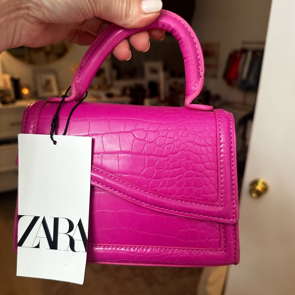 Brand new Zara small hot pink purse with short and long strap.